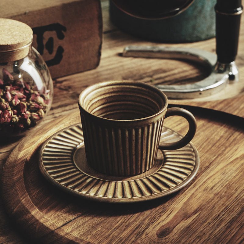 Playthings Japanese Single Product Coffee Cup With Saucer, Stoneware Stripes $37.49 Dana Fashion Color: Sauce yellow Dana's Kitchen Product Information: Material: pottery Style: Japanese Popular elements: retro style Color classification: Fog white, sligh