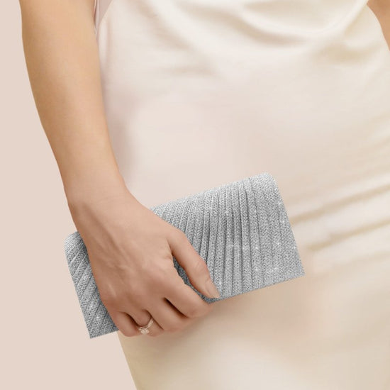 Pleated Party Dinner Bag $39.32 Dana Fashion Color: Black Women's Bags Product information: Lining texture: Polyester Applicable scenarios: Daily matching Color: blue, silver, champagne, black, Rose Red Hardness: medium and soft Material: PVC Suitcase sha