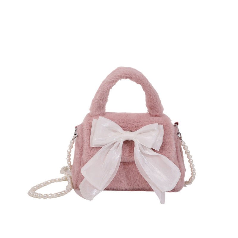 Plush Bag Commuter Pearl Hand Shoulder Messenger Bag $23.38 Dana Fashion Color: Black Women's Bags Product information: Applicable scenarios: Daily matching Color: black, white, brown, pink Outer bag type: open pocket Hardness: soft Material: Nylon Suitca