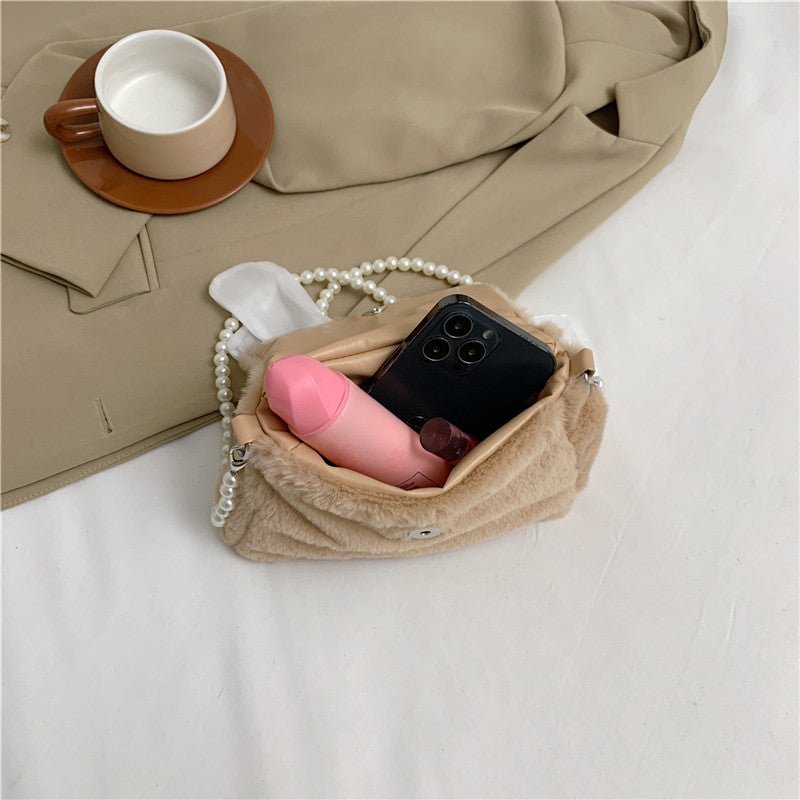 Plush Bag Commuter Pearl Hand Shoulder Messenger Bag $23.38 Dana Fashion Color: Black Women's Bags Product information: Applicable scenarios: Daily matching Color: black, white, brown, pink Outer bag type: open pocket Hardness: soft Material: Nylon Suitca