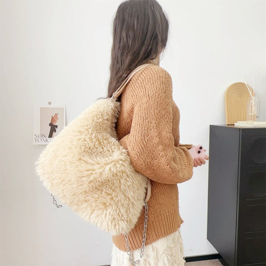 Plush Hand-carrying Bag Shoulder Large Capacity $58.37 Dana Fashion Color: Black Women's Bags Product information: Color: white, gray, khaki, camel, black Hardness: soft Material: Plush Suitcase shape: square vertical model Popular elements: sequins, maca