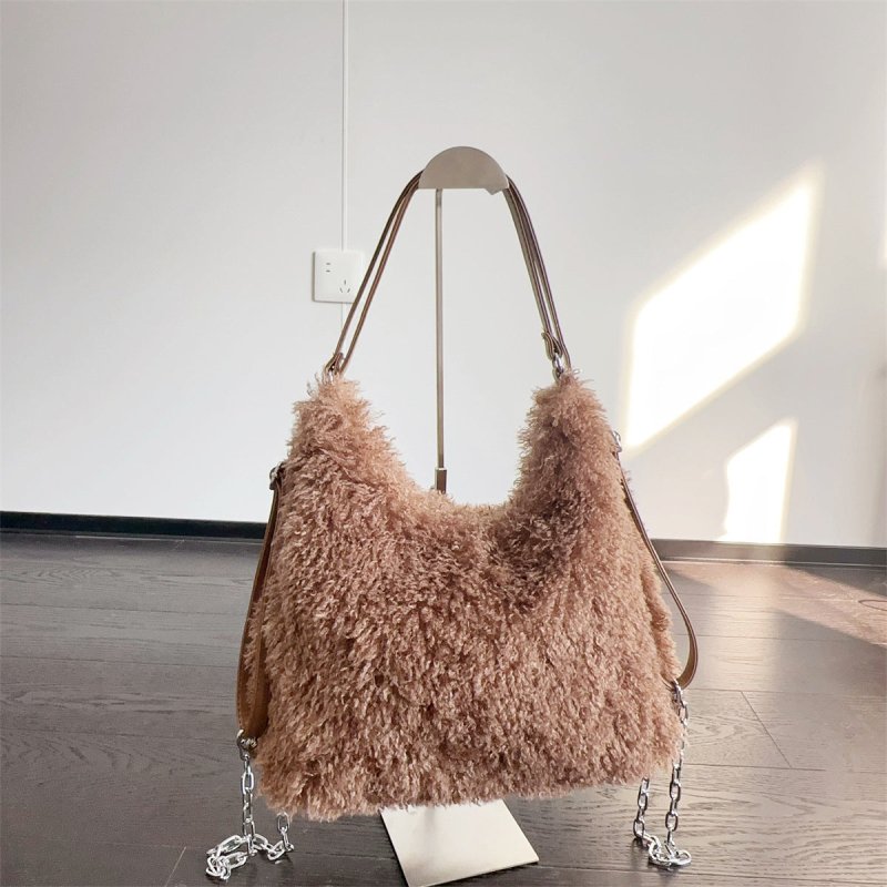 Plush Hand-carrying Bag Shoulder Large Capacity $58.37 Dana Fashion Color: Camel Women's Bags Product information: Color: white, gray, khaki, camel, black Hardness: soft Material: Plush Suitcase shape: square vertical model Popular elements: sequins, maca