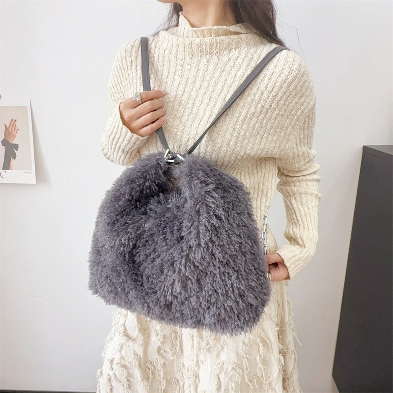 Plush Hand-carrying Bag Shoulder Large Capacity $58.37 Dana Fashion Color: Black Women's Bags Product information: Color: white, gray, khaki, camel, black Hardness: soft Material: Plush Suitcase shape: square vertical model Popular elements: sequins, maca