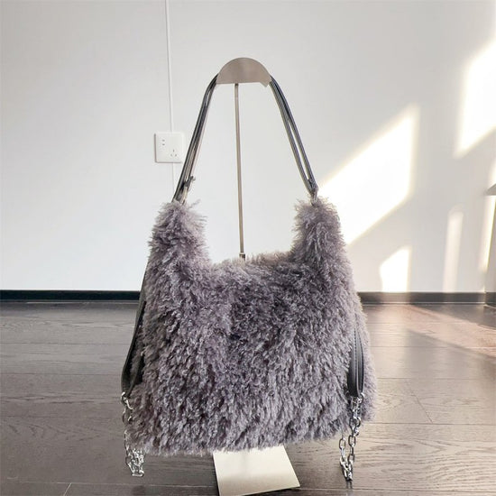 Plush Hand-carrying Bag Shoulder Large Capacity $58.37 Dana Fashion Color: Gray Women's Bags Product information: Color: white, gray, khaki, camel, black Hardness: soft Material: Plush Suitcase shape: square vertical model Popular elements: sequins, macar