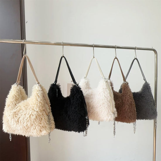 Plush Hand-carrying Bag Shoulder Large Capacity $58.37 Dana Fashion Color: Black Women's Bags Product information: Color: white, gray, khaki, camel, black Hardness: soft Material: Plush Suitcase shape: square vertical model Popular elements: sequins, maca