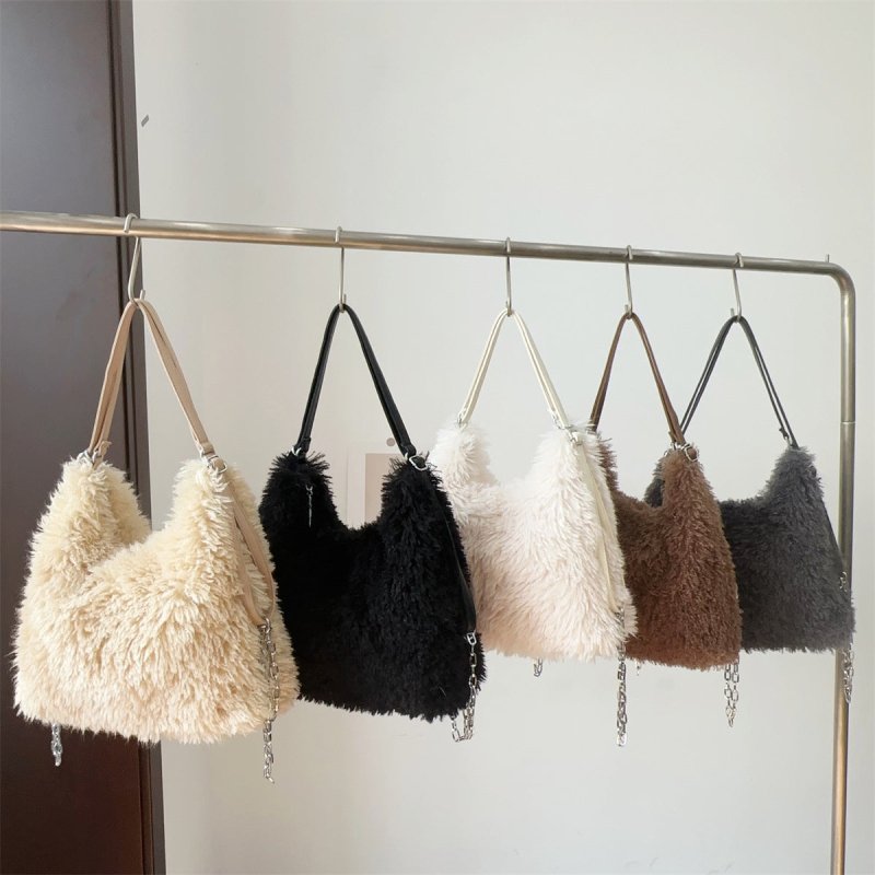 Plush Hand-carrying Bag Shoulder Large Capacity $58.37 Dana Fashion Color: Black Women's Bags Product information: Color: white, gray, khaki, camel, black Hardness: soft Material: Plush Suitcase shape: square vertical model Popular elements: sequins, maca