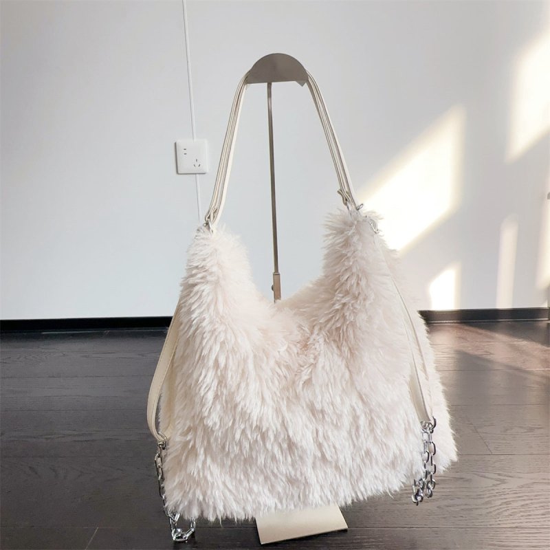 Plush Hand-carrying Bag Shoulder Large Capacity $58.37 Dana Fashion Color: White Women's Bags Product information: Color: white, gray, khaki, camel, black Hardness: soft Material: Plush Suitcase shape: square vertical model Popular elements: sequins, maca