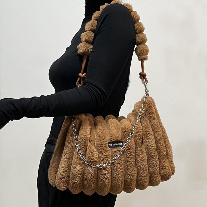 Plush Retro One-shoulder Crossbody Bag $45.63 Dana Fashion Color: Black Tie Color Bag MB Women's Bags Product information: Color: Black Tie color package MB, khaki MNB, color MB Material: Plush Suitcase shape: Horizontal Square Bag internal structure: zip