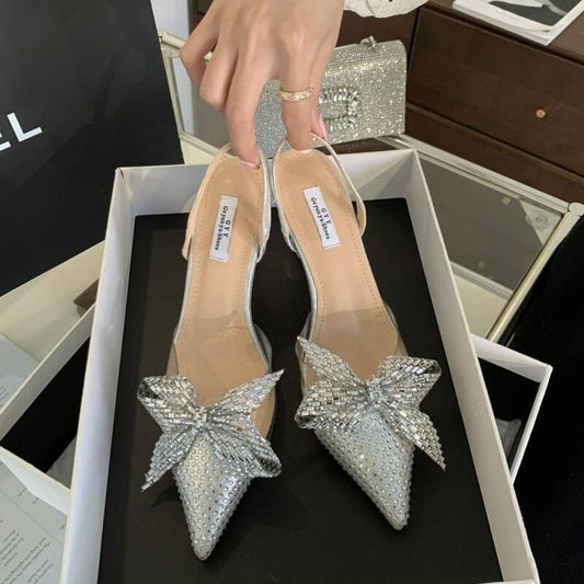 Pointed Toe Graceful Bow High Heels $59.50 Dana Fashion Color: Black Size: 35 Women's shoes Product information: Lining material: PU Toe holder shape: Pointed Color: silver, black Shoe Upper material: Satin Sock length: over the knee Heel shape: stiletto