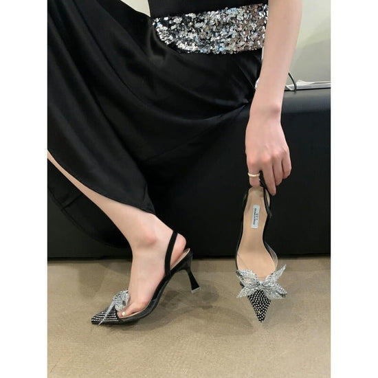 Pointed Toe Graceful Bow High Heels $59.50 Dana Fashion Color: Black Size: 35 Women's shoes Product information: Lining material: PU Toe holder shape: Pointed Color: silver, black Shoe Upper material: Satin Sock length: over the knee Heel shape: stiletto