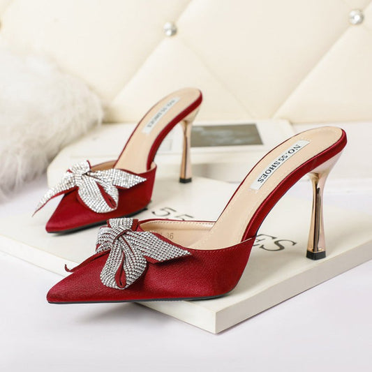 Pointed Toe Pumps Bow Sandals $53.99 Dana Fashion Color: Apricot Size: 34 Women's shoes Overview: Unique design, stylish and beautiful. Good material, comfortable feet. A variety of colors, any choice. Specification: Color: black, apricot, wine red Size:
