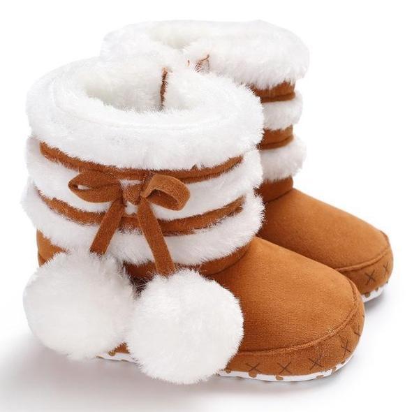 Pom Pom Winter Booties $19.97 Dana Fashion Color: brown size: 11CM Baby & Mother Are you looking for the cutest winter booties for your tot? The Pom Pom Winter Booties are perfect! Featuring a wide toe box for a comfy fit, flexible suede uppers for mobili