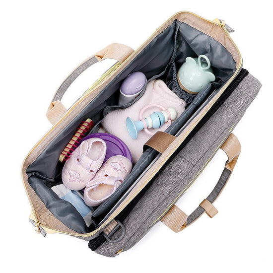 Portable folding crib mummy bag $158.92 Dana Fashion Color: Black Baby & Mother Name: Baby crib portable bag Color classification: green/gray/black Body capacity: 25L Fabric: Oxford cloth Mattress size: length 80cm width 38cm Body size: length 40 cm width