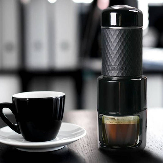 Portable Manual Espresso Coffee Machine $179.00 Dana Fashion Color: Black set Dana's Kitchen Overview: Convenient to carry, easy to clean and use, suitable for use The pressure bar slide is optimized for quieter use. After the slide is optimized, the soun