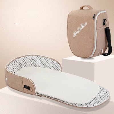 Portable Removable Folding Crib Baby Bed Mammy Bag $124.62 Dana Fashion Color: Khaki style: Comfortable Baby & Mother Overview: Uterine bionic design, deep sleep Protect your baby's spine Breathable awning cut off mosquito Note: Difference between flagshi