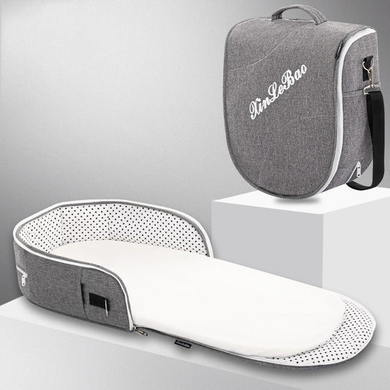 Portable Removable Folding Crib Baby Bed Mammy Bag $124.62 Dana Fashion Color: Grey style: Comfortable Baby & Mother Overview: Uterine bionic design, deep sleep Protect your baby's spine Breathable awning cut off mosquito Note: Difference between flagship