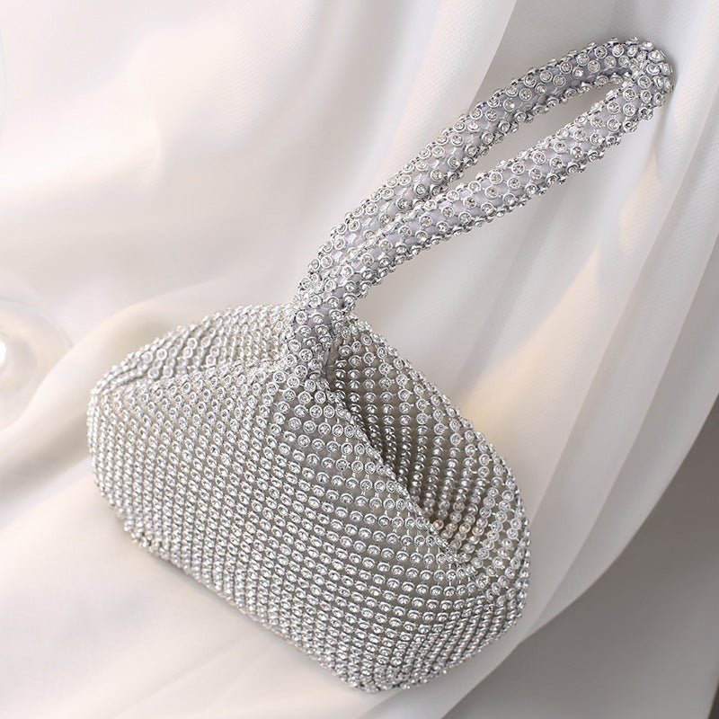 Portable Rhinestone Party Evening Bags $50.00 Dana Fashion Color: Black Size: Large Women's Bags Material: Silk Fabric texture: polyester Lining texture: polyester Bag shape: dumpling type Color: black, silver, gold, champagne