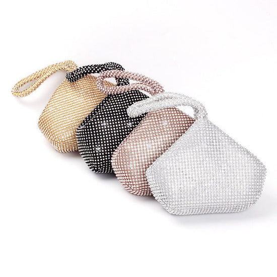 Portable Rhinestone Party Evening Bags $50.00 Dana Fashion Color: Black Size: Large Women's Bags Material: Silk Fabric texture: polyester Lining texture: polyester Bag shape: dumpling type Color: black, silver, gold, champagne