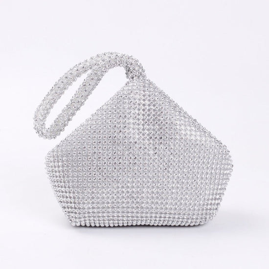 Portable Rhinestone Party Evening Bags $50.00 Dana Fashion Color: Silver Size: Large Women's Bags Material: Silk Fabric texture: polyester Lining texture: polyester Bag shape: dumpling type Color: black, silver, gold, champagne
