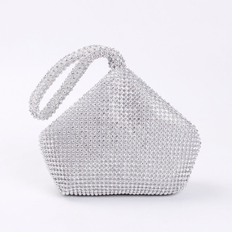Portable Rhinestone Party Evening Bags $50.00 Dana Fashion Color: Silver Size: Large Women's Bags Material: Silk Fabric texture: polyester Lining texture: polyester Bag shape: dumpling type Color: black, silver, gold, champagne