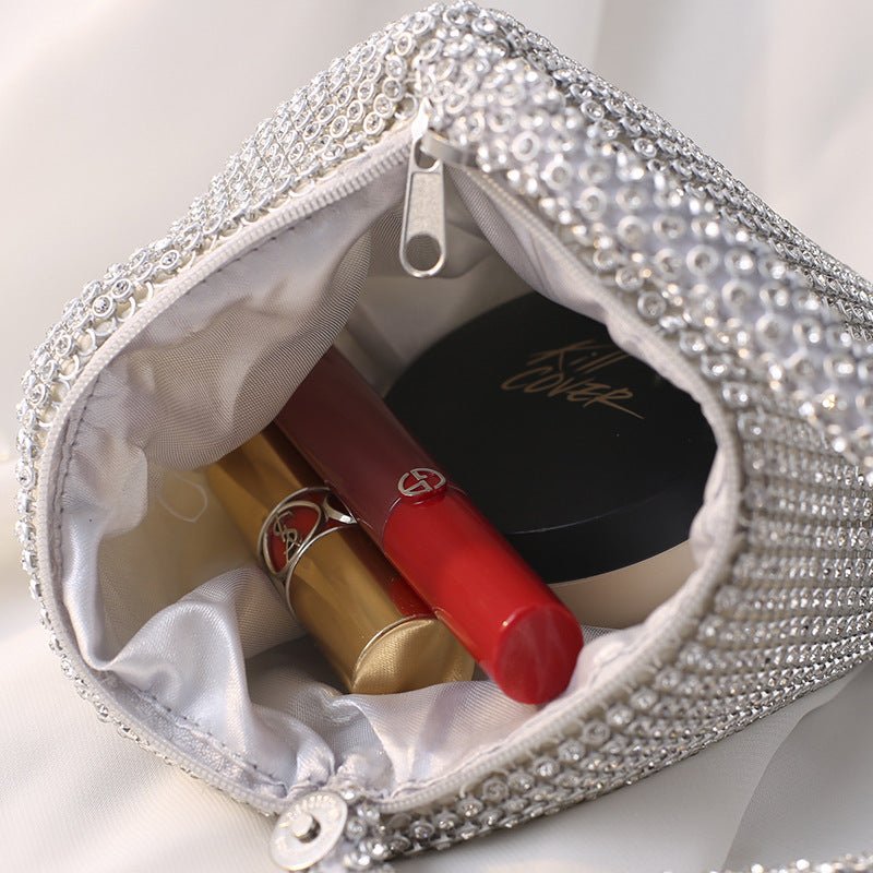 Portable Rhinestone Party Evening Bags $50.00 Dana Fashion Color: Black Size: Large Women's Bags Material: Silk Fabric texture: polyester Lining texture: polyester Bag shape: dumpling type Color: black, silver, gold, champagne