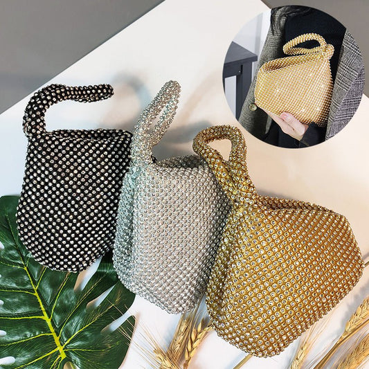 Portable Rhinestone Party Evening Bags $50.00 Dana Fashion Color: Black Size: Large Women's Bags Material: Silk Fabric texture: polyester Lining texture: polyester Bag shape: dumpling type Color: black, silver, gold, champagne
