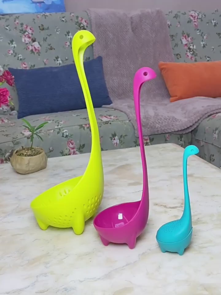 Cute Dinosaur Standing Spoon $19.00 Dana Fashion Color: 3 colour style: With packaging Dana's Kitchen Features: Brand new and high quality. Durable food grade PP material. Cute cartoon dinosaur design. Description: Production:Dinnerware Size: 8*8*24cm Mat