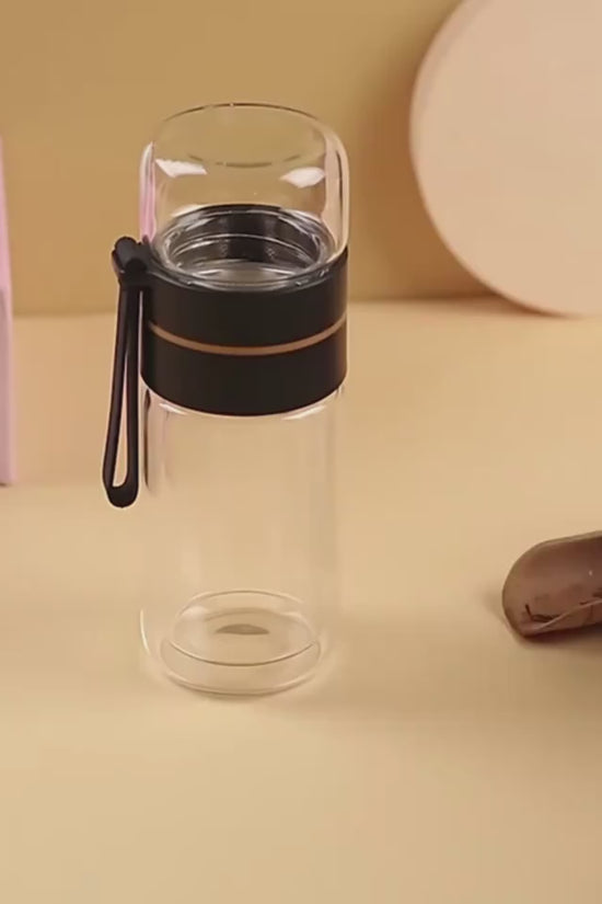 Glass Water Bottle With Tea Infuser Filter Tea Separation Double Wall Glass Bottle Leakproof Water Bottle $32.35 Dana Fashion Color: Black Capacity size: 400ml Dana's Kitchen Overview: 1. Tea water separation design, you can use the tea warehouse to make