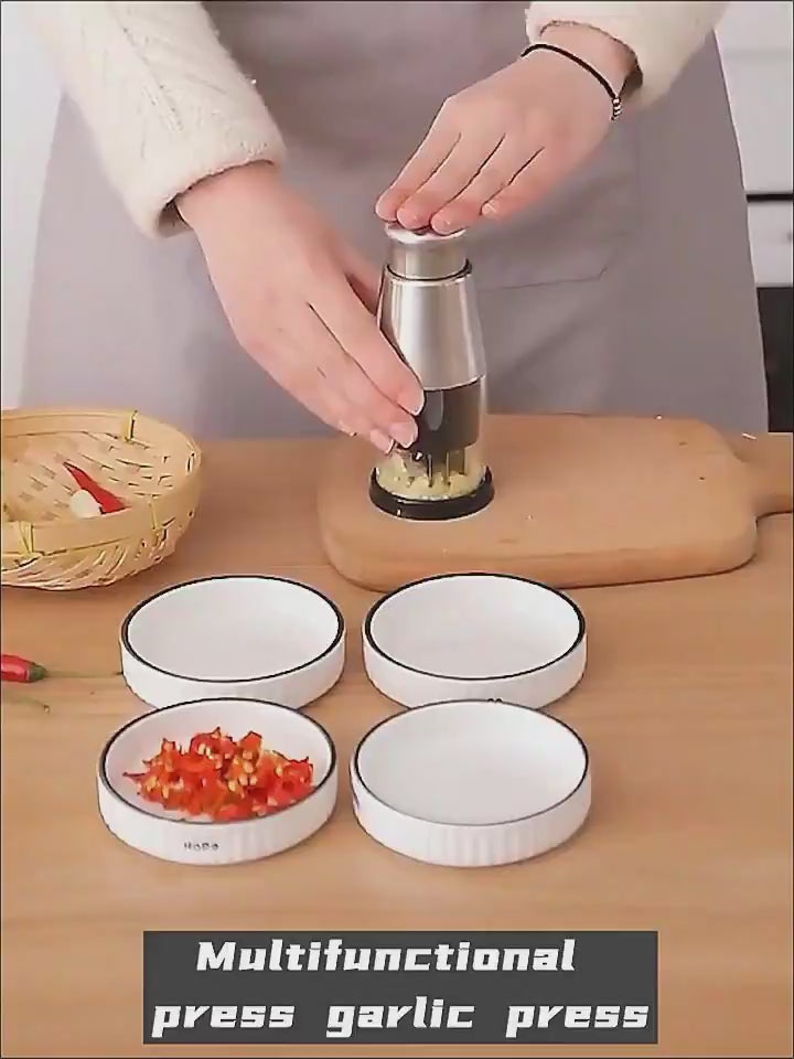 Garlic Crusher Onion Chopper Multipeler Vegetables Chopper Manual Garlic Press Machine Garlic Squeezer Kitchen Gadget $26.23 Dana Fashion format: Black Dana's Kitchen Overview: The stainless steel onion chopper is ideal for chopping onions, vegetables, an