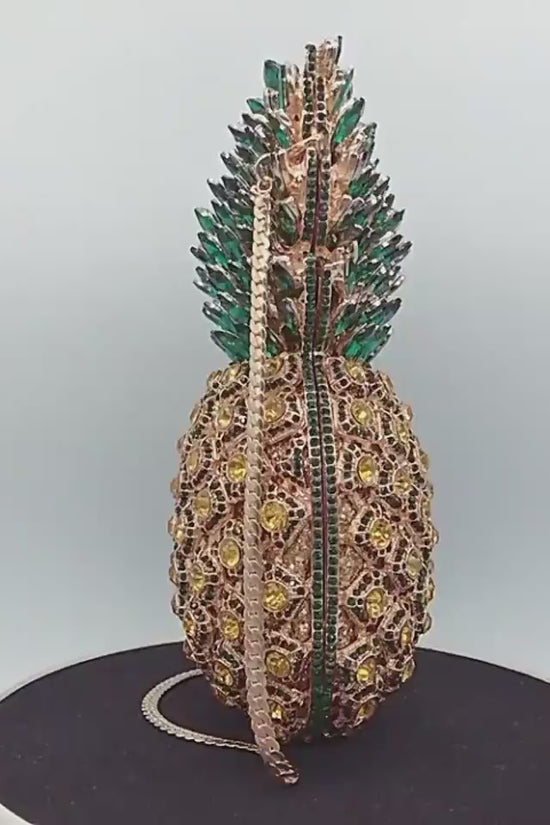 Pineapple Rhinestone Banquet Clutch $169.00 Dana Fashion Color: Color2 Women's Bags Material: metal Applicable scenarios: meal bag, banquet bag, evening bag, banquet bag Fabric texture: alloy Lining material: PU Bag shape: pineapple Size: 20x10x10cm Popul