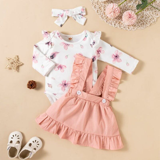 Printed Long-sleeved Baby Girl Romper Two-color Strap Ruffled Dress Headdress Three Pieces $25.90 Dana Fashion Color: Pink Suit Height: 100cm Baby Clothing Product information: Pattern: solid color, flowers Color: pink, wine red Suitable height: 80cm,90cm