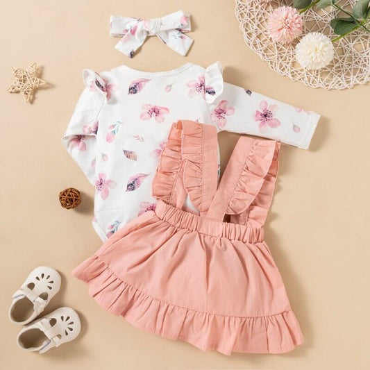 Printed Long-sleeved Baby Girl Romper Two-color Strap Ruffled Dress Headdress Three Pieces $25.90 Dana Fashion Color: Pink Suit Height: 100cm Baby Clothing Product information: Pattern: solid color, flowers Color: pink, wine red Suitable height: 80cm,90cm