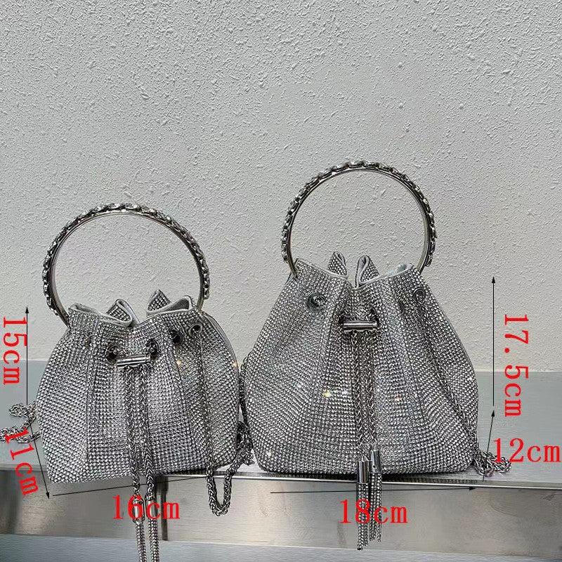 Rainbow Tassel Shiny Hand Diamond Bag $59.00 Dana Fashion Color: Black Size: L Women's Bags Specifications: Color: Pink, pink, blue, purple, black, yellow, rainbow, multicolored, braided green, green diamond Style: Street trend Material: Acrylic Popular e