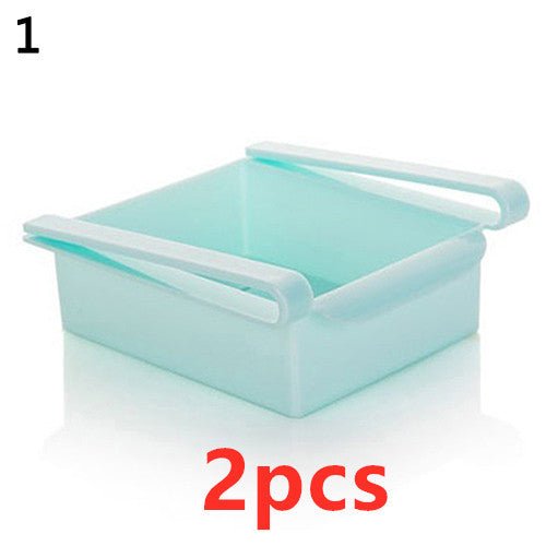 Refrigerator Storage Basket Stretchable Multifunction Kitchen Refrigerator Storage Box $28.96 Dana Fashion Color: 2PCS Blue1 Dana's Kitchen Overview: 1. Stretchable Design: You can adjust the holder according to the size of your belongings 2. Durable: Mad
