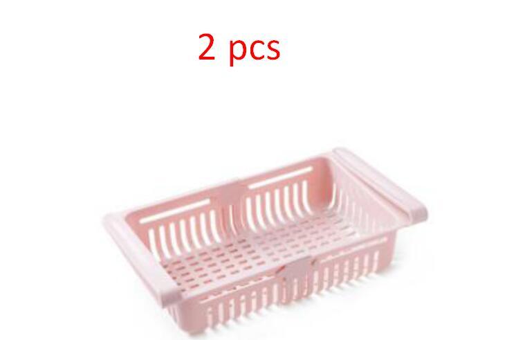 Refrigerator Storage Basket Stretchable Multifunction Kitchen Refrigerator Storage Box $27.74 Dana Fashion Color: Pink 2pcs Dana's Kitchen Overview: 1. Stretchable Design: You can adjust the holder according to the size of your belongings 2. Durable: Made