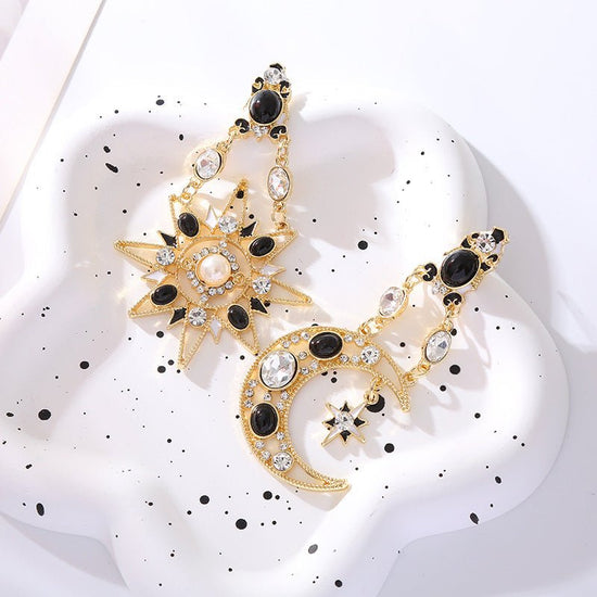 Retro Exaggerated Earrings For Women Rhinestone Pearl Moon $17.15 Dana Fashion Color: Star Moon Women's Accessories Product information: Treatment Process: Diamond Color: XINGX and Moon Applicable population: Female Material: Glass drill Pearl Shape: Star