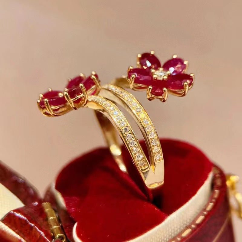 Retro Exquisite High-grade Flower Ruby Ring For Women $26.56 Dana Fashion Color: X1815 Ring Size: Adjustable Opening Women's Accessories Product information: Type: open mouth Treatment Process: Electroplating Color: x1815 Applicable people: women Size: ad