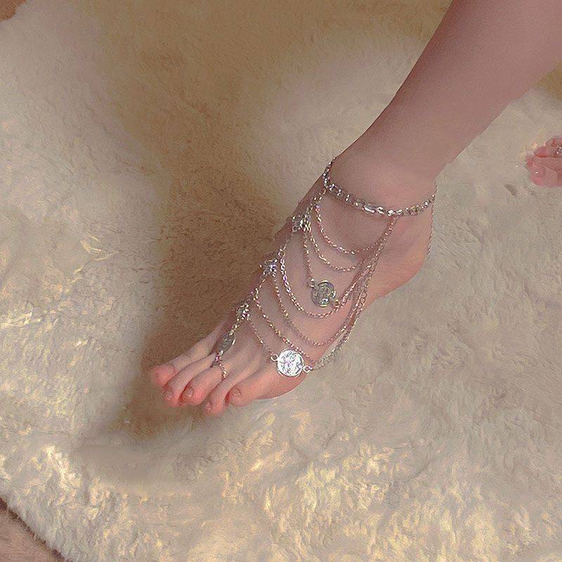 Retro Fashion Multi-layer Tassel Anklet For Women $15.00 Dana Fashion Color: 30801 Silver Anklet Women's Accessories Product information: Type: Anklet Color: 30801 Golden-single, 30801 silver-anklet, 31003 Golden-single, 2603 silver-single, 31002 Golden-s