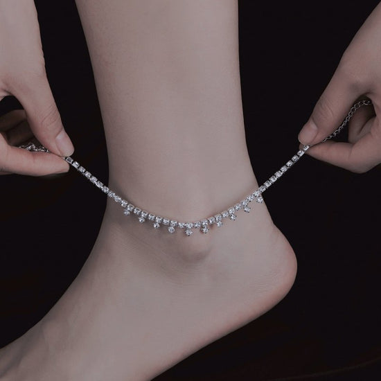 Retro Fashion Multi-layer Tassel Anklet For Women $15.00 Dana Fashion Color: 22932 Silver Anklet Women's Accessories Product information: Type: Anklet Color: 30801 Golden-single, 30801 silver-anklet, 31003 Golden-single, 2603 silver-single, 31002 Golden-s