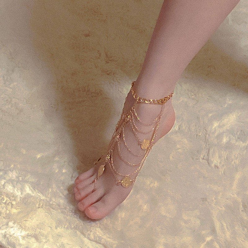 Retro Fashion Multi-layer Tassel Anklet For Women $15.00 Dana Fashion Color: 30801 Gold Single Women's Accessories Product information: Type: Anklet Color: 30801 Golden-single, 30801 silver-anklet, 31003 Golden-single, 2603 silver-single, 31002 Golden-sin