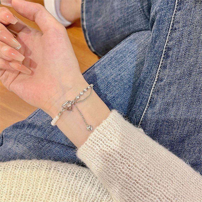 Retro Love Pearl Bracelet Women's Bracelet $9.00 Dana Fashion Color: Pink Women's Accessories Product information: Treatment Process: Electroplating Color: 5762701 Style: Unisex Material: Alloy Perimeter: 21cm (inclusive)-50cm (inclusive) Packing list: 1*