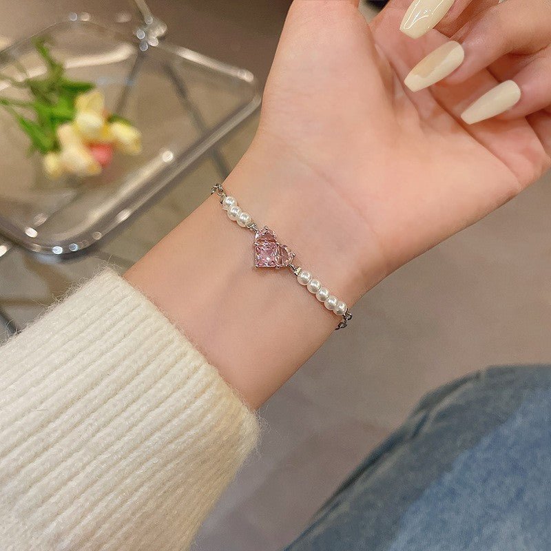Retro Love Pearl Bracelet Women's Bracelet $9.00 Dana Fashion Color: Pink Women's Accessories Product information: Treatment Process: Electroplating Color: 5762701 Style: Unisex Material: Alloy Perimeter: 21cm (inclusive)-50cm (inclusive) Packing list: 1*