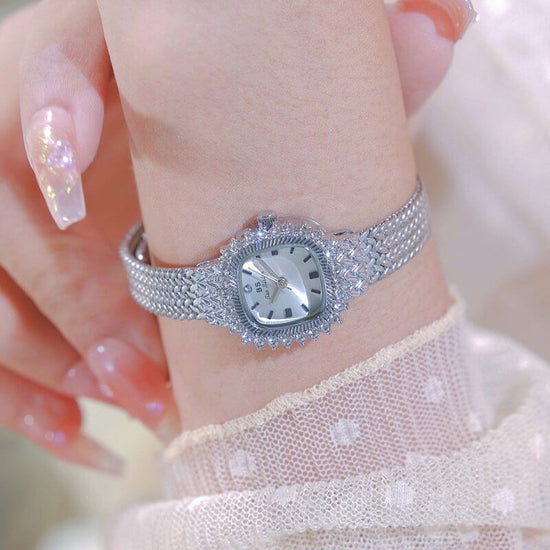 Retro Lucky Small Square Wheat Mini Watch $39.50 Dana Fashion Color: Champagne Gold Women's Accessories Product information: Color: Gold White, classic silver, champagne gold Thickness: 7mm Movement type: Quartz Crown type: Spiral crown Mirror material: m
