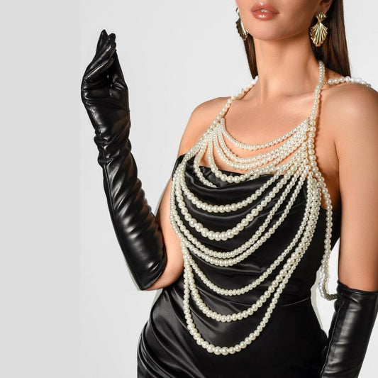 Retro Multi-layer Pearl Body Chains $45.00 Dana Fashion Color: Black And White Women's Accessories Product information: Treatment Process: hand-woven Color: white, black and white Pendant material: Imitation Pearl Chain style: ball bead necklace Material: