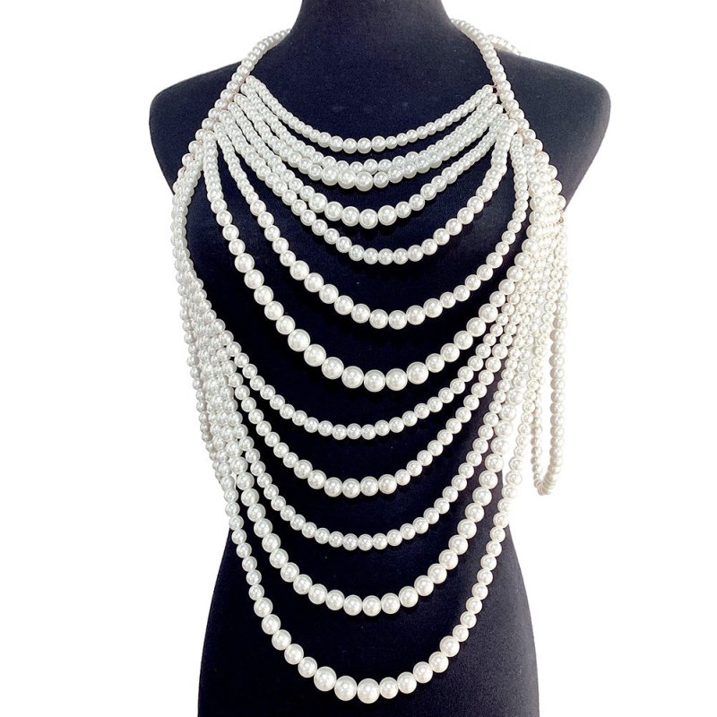 Retro Multi-layer Pearl Body Chains $45.00 Dana Fashion Color: White Women's Accessories Product information: Treatment Process: hand-woven Color: white, black and white Pendant material: Imitation Pearl Chain style: ball bead necklace Material: Imitation