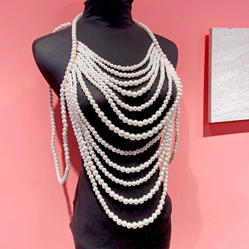 Retro Multi-layer Pearl Body Chains $45.00 Dana Fashion Color: Black And White Women's Accessories Product information: Treatment Process: hand-woven Color: white, black and white Pendant material: Imitation Pearl Chain style: ball bead necklace Material: