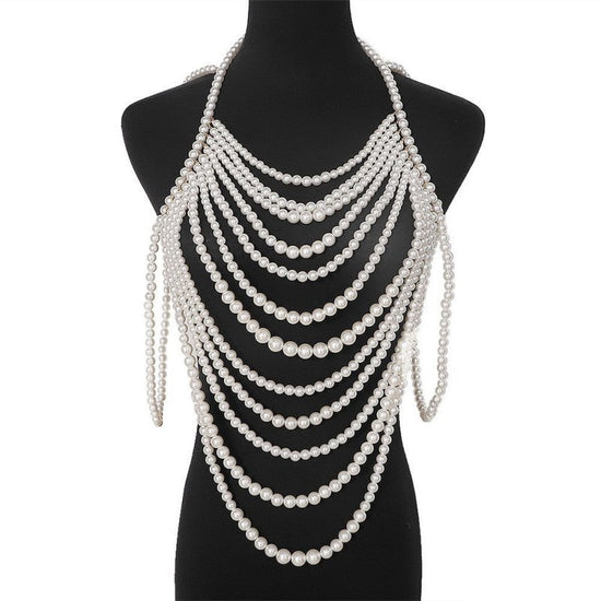 Retro Multi-layer Pearl Body Chains $45.00 Dana Fashion Color: Black And White Women's Accessories Product information: Treatment Process: hand-woven Color: white, black and white Pendant material: Imitation Pearl Chain style: ball bead necklace Material: