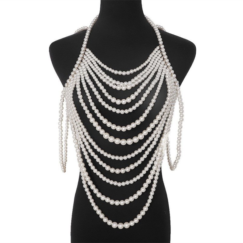 Retro Multi-layer Pearl Body Chains $45.00 Dana Fashion Color: Black And White Women's Accessories Product information: Treatment Process: hand-woven Color: white, black and white Pendant material: Imitation Pearl Chain style: ball bead necklace Material: