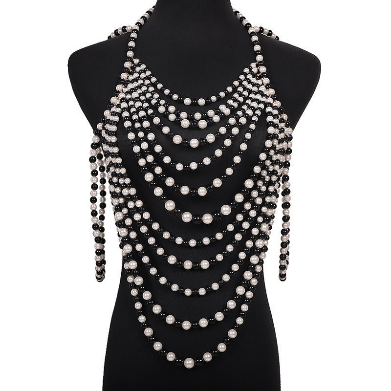 Retro Multi-layer Pearl Body Chains $45.00 Dana Fashion Color: Black And White Women's Accessories Product information: Treatment Process: hand-woven Color: white, black and white Pendant material: Imitation Pearl Chain style: ball bead necklace Material: