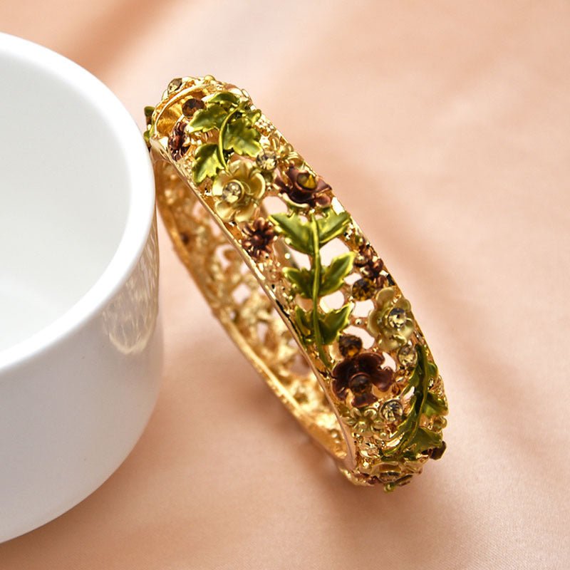Retro Rose Diamond Studded Hollow Alloy Cloisonne Antique Painted Bracelet For Women $21.38 Dana Fashion Color: 05 Brown 1496 Women's Accessories Product information: Treatment Process: Electroplating Color: 01 red 1492,02 purple 1493,03 blue 1494,04 colo